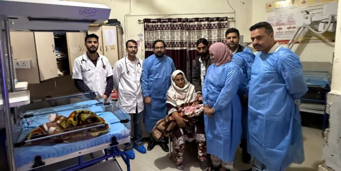 Doctors at GMC Doda celebrate successful management of a newborn